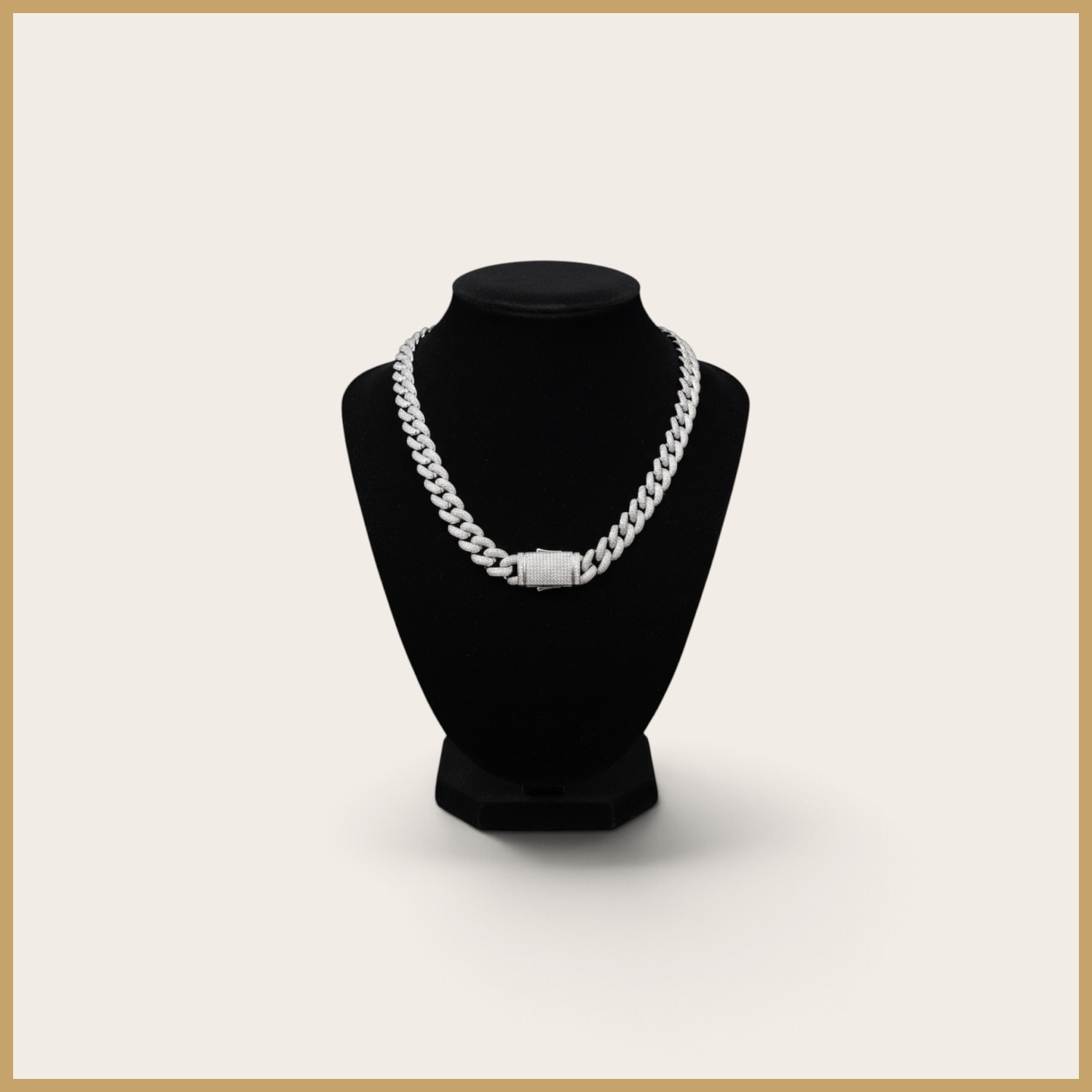 A moissanite Cuban chain on a display bust