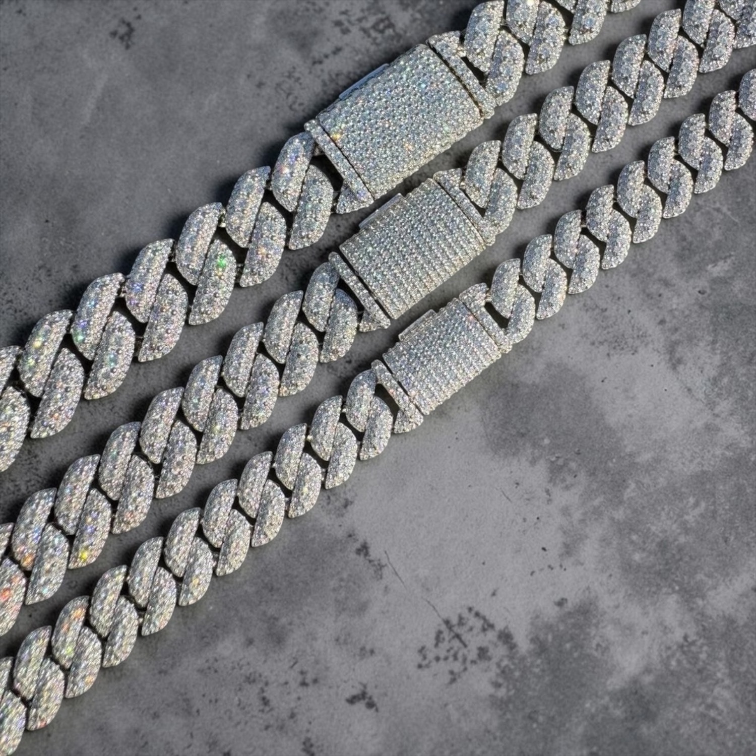 Three iced Cuban chains in white gold