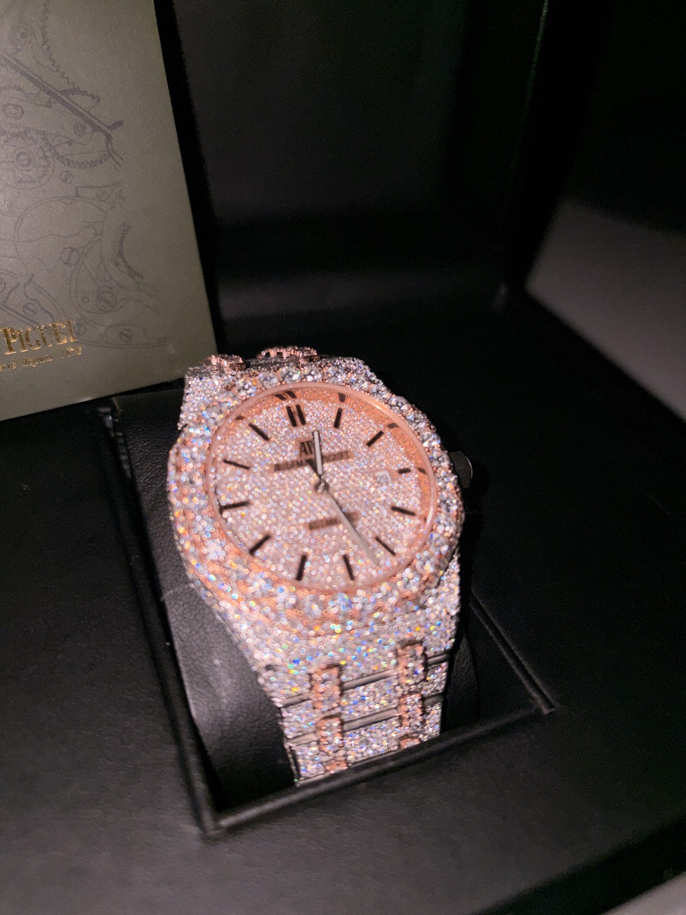 Iced watch in a black case